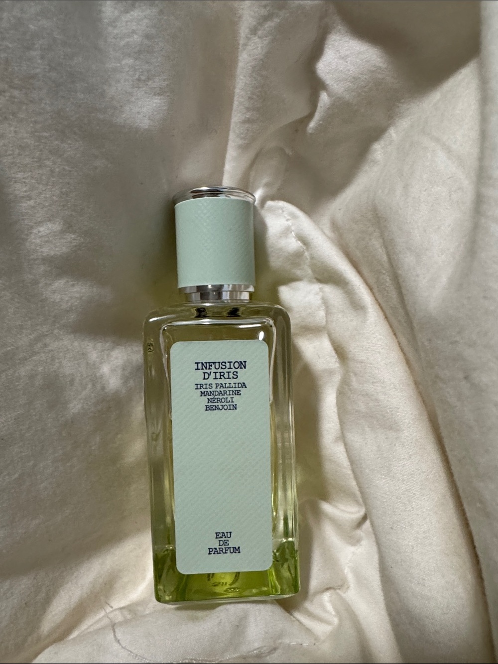 Prada pale mint green perfume bottle with silver plaque